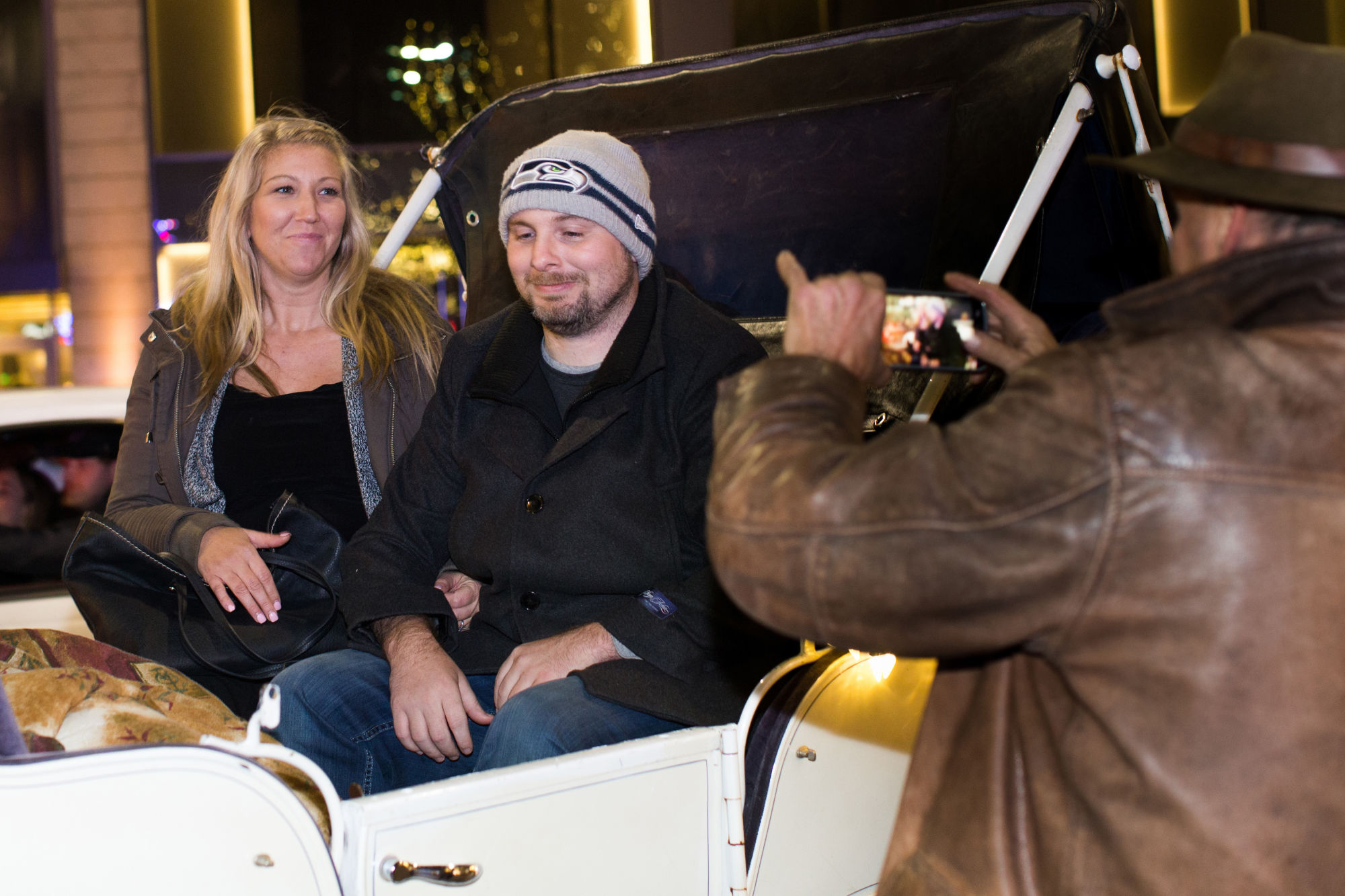 Meredith Settle and Matt Lininger included a ride on Sealth Horse Carriage as part of their wedding engagement. “We cuddled under the blankets,” Settle said. © Karen Ducey for Crosscut