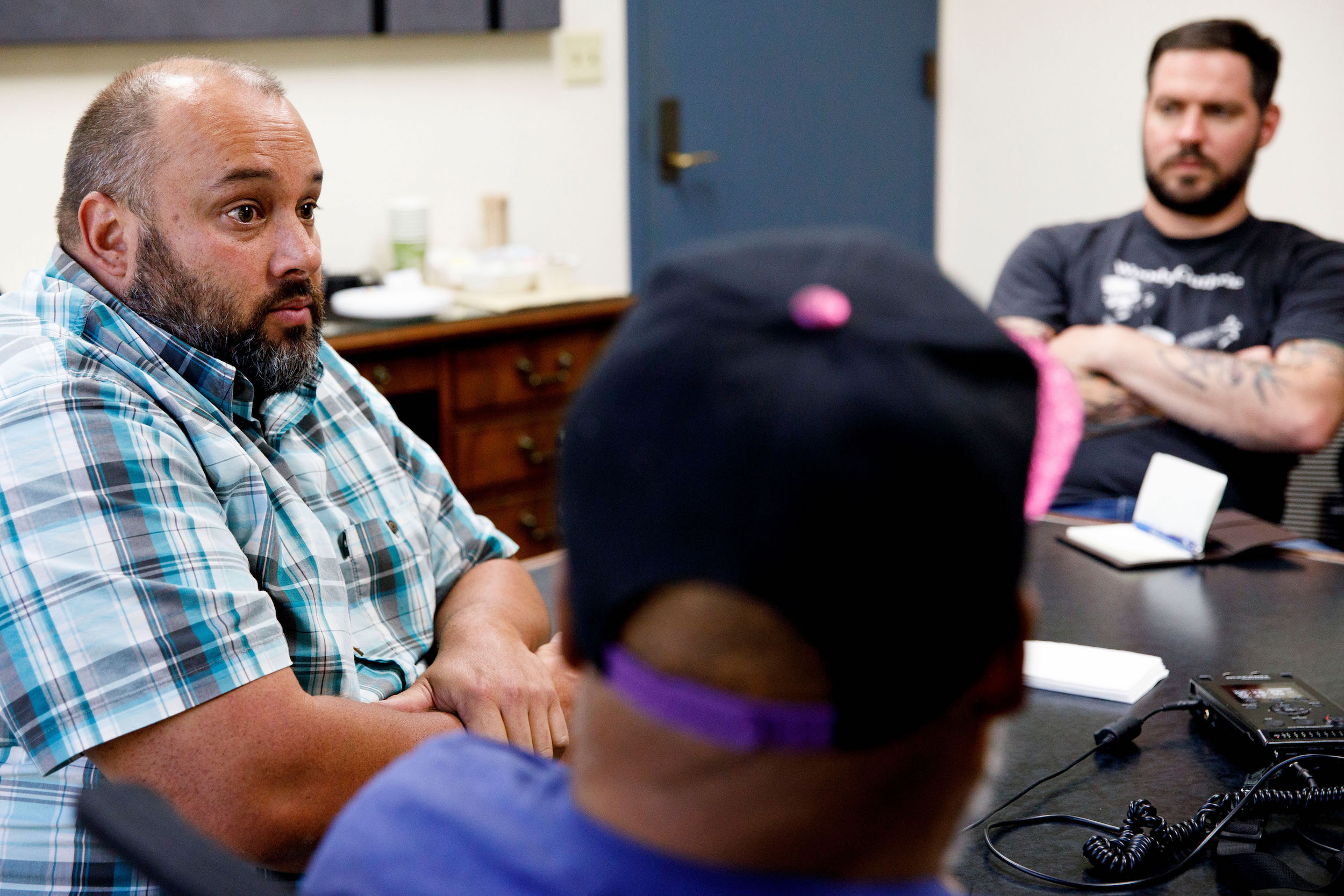 Kevin Sur, left, speaks on Wednesday, September 5, 2018 during a MeToo roundtable at Cascade Public Media in Seattle, Wash. The men, influencers in the local food, music and arts scene, discussed ways to break the cycle of sexual misconduct.(Photos by Sarah Hoffman/Crosscut)