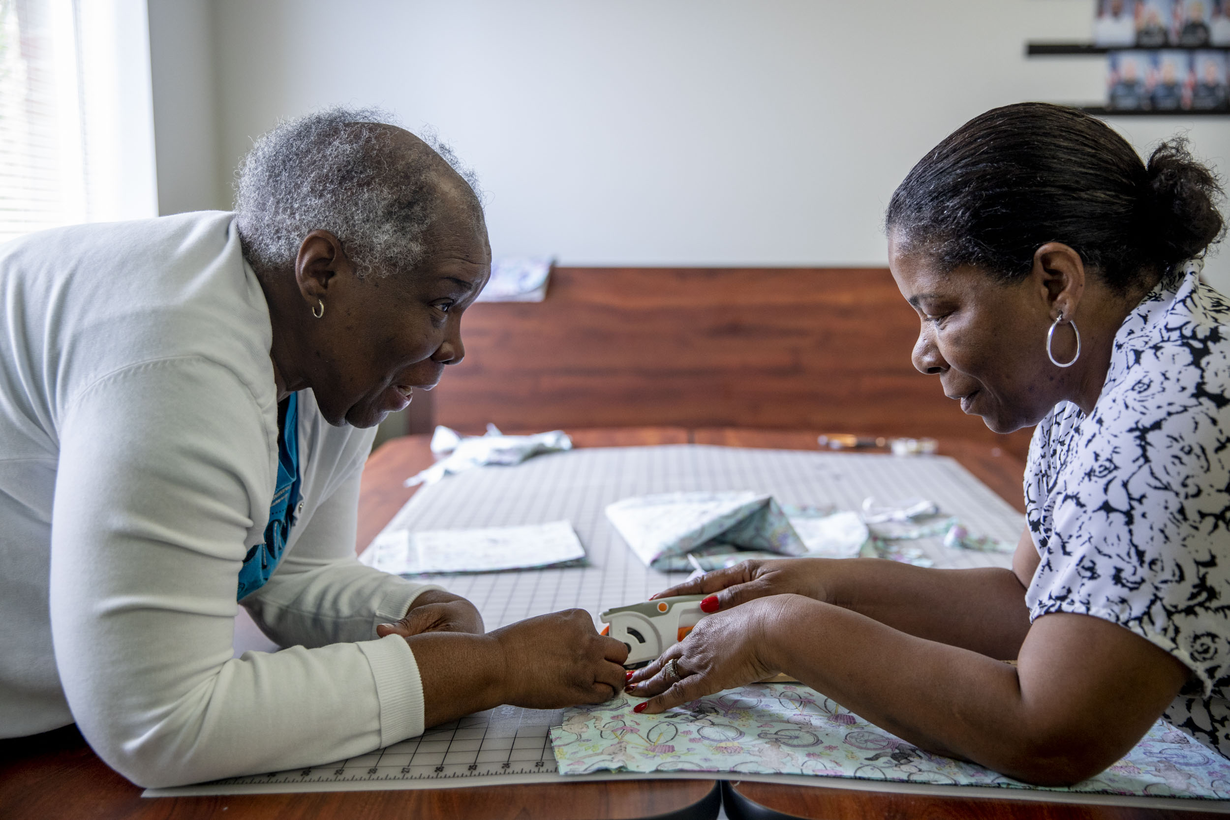 Gloria and Alesia sewing