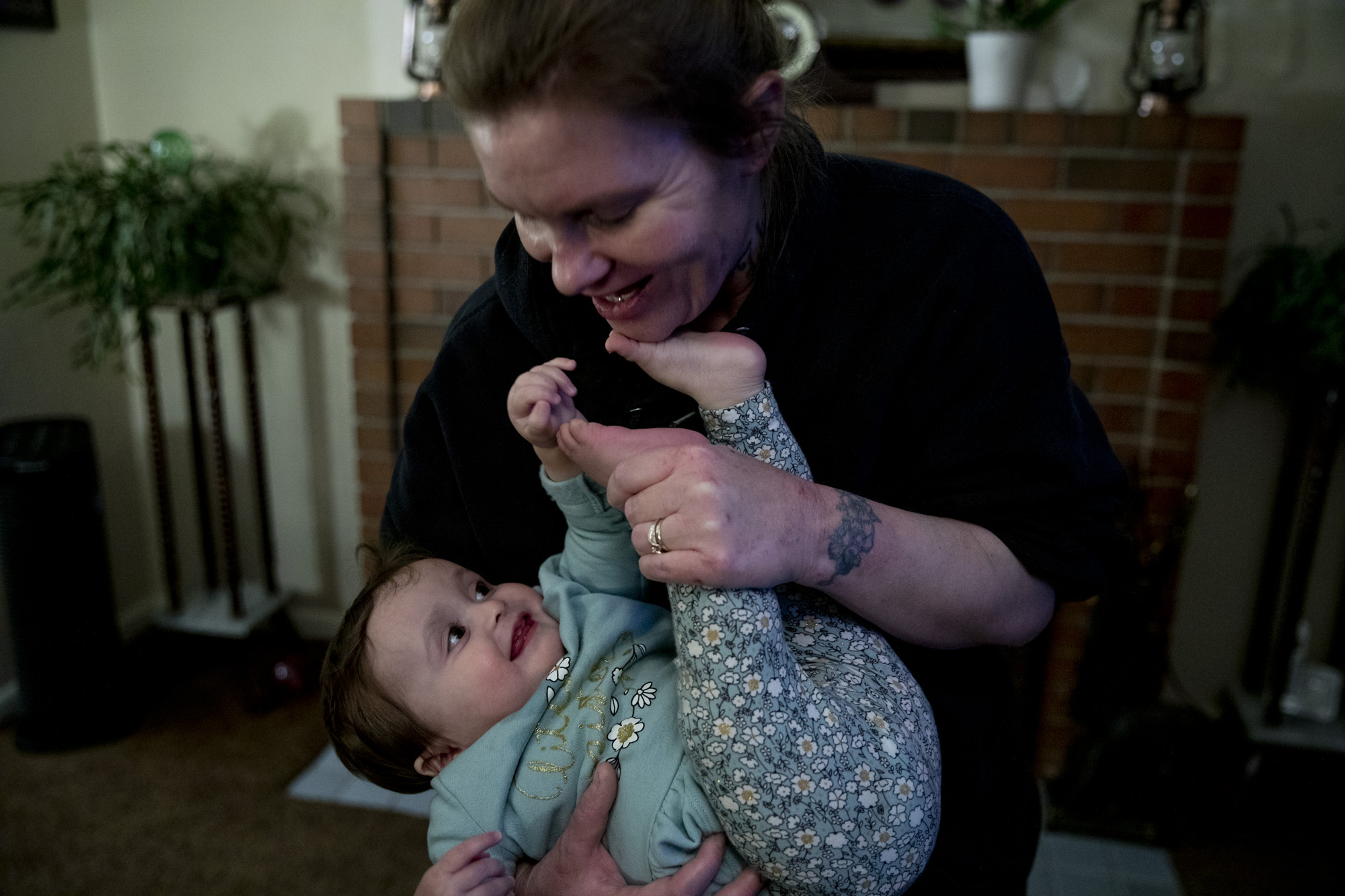 Becca plays with her daughter