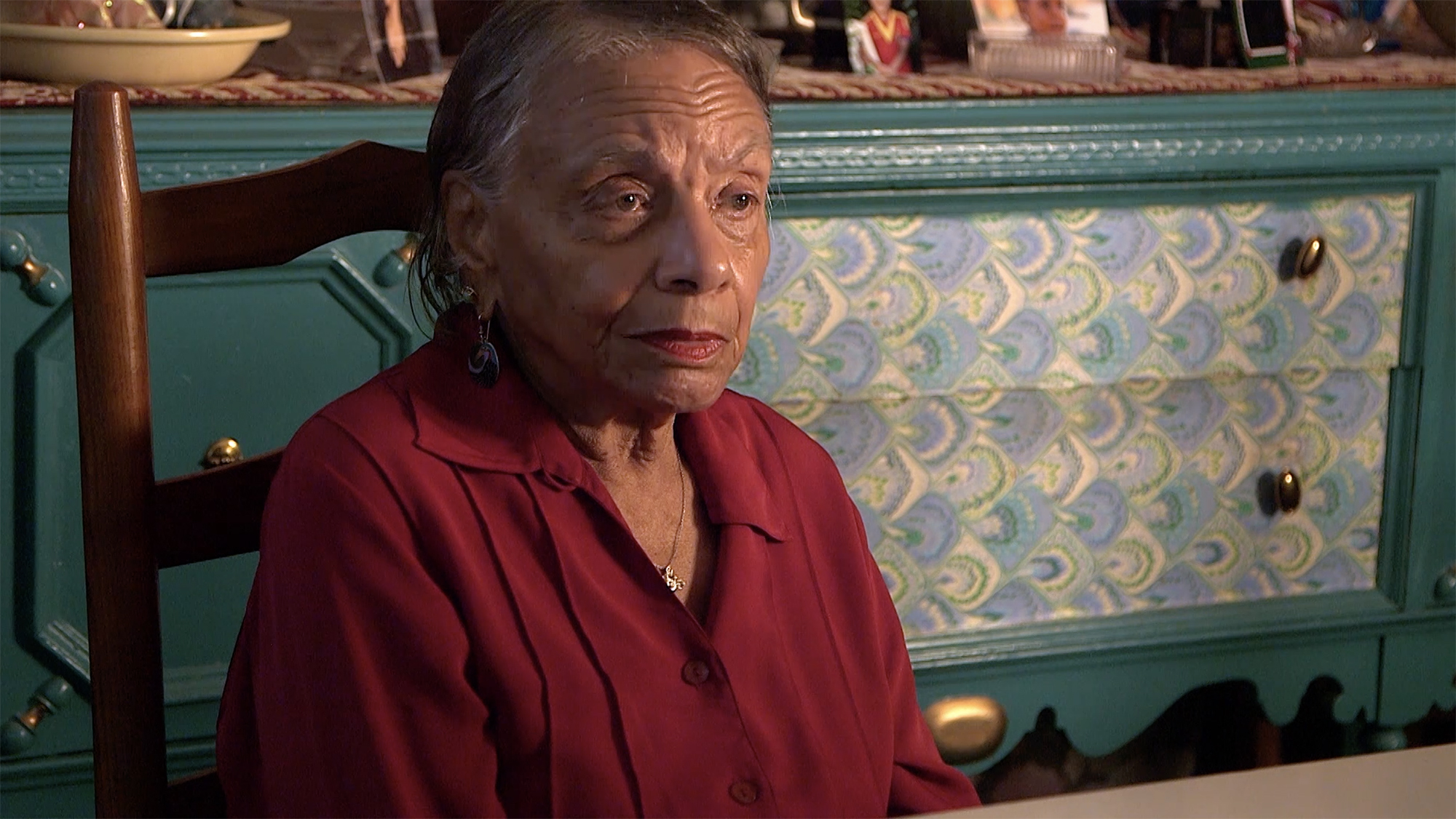 Close-up of woman in red shirt 