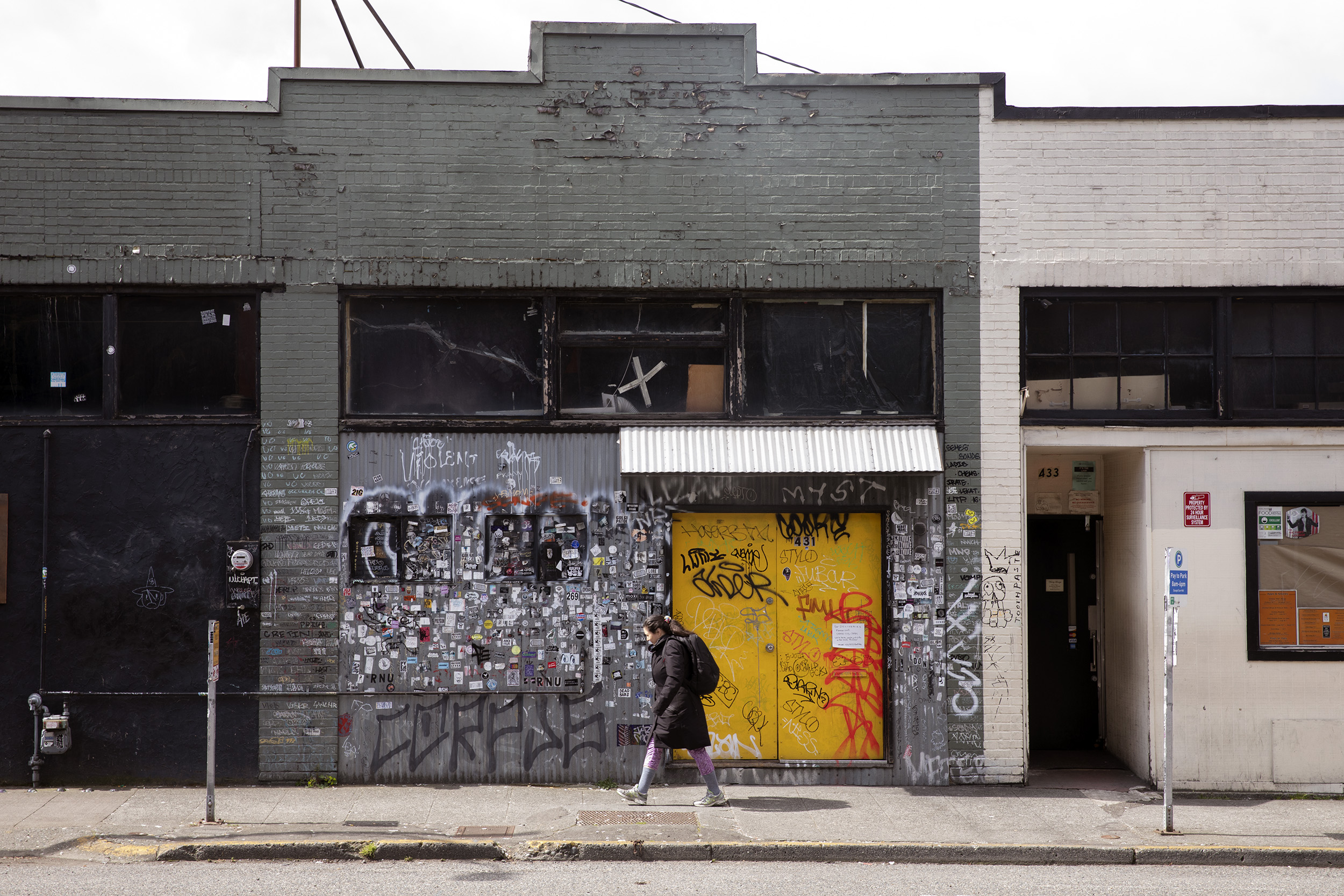 Gray doors with graffiti 