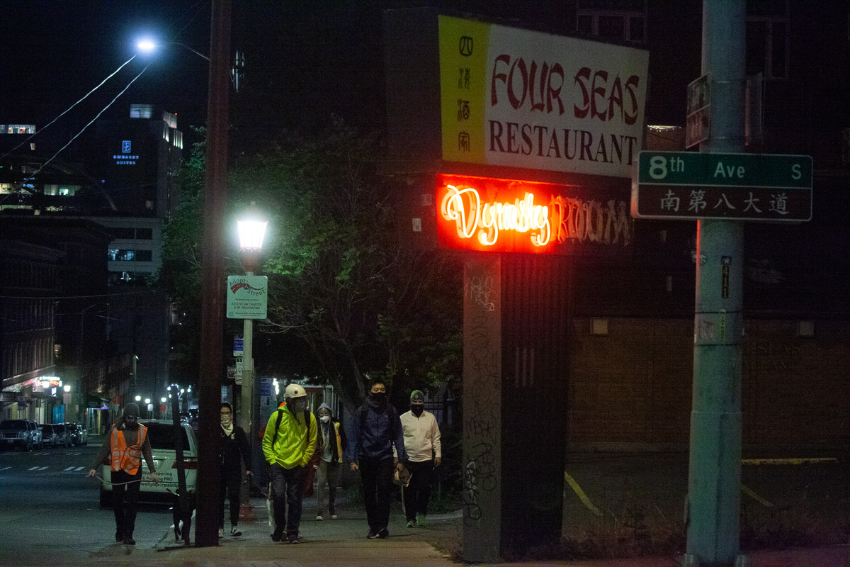 people walking at night