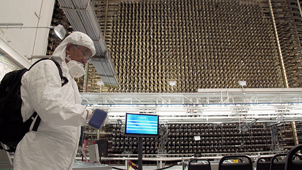 Mitsugi Moriguchi, thought to be the first survivor of the Nagasaki bombing to visit Hanford, wore a Tyvek suit on a tour of B Reactor, because of concerns about radiation.