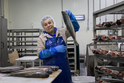 Worker at seafood distributor Ocean Beauty