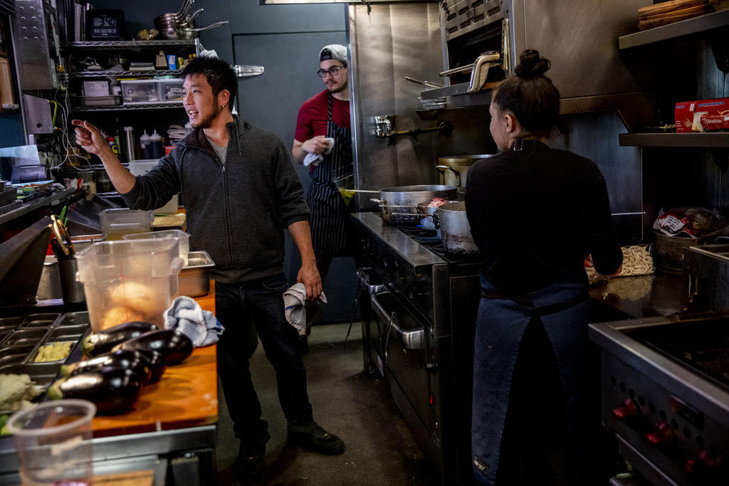 Chef Shota looks at order in kitchen