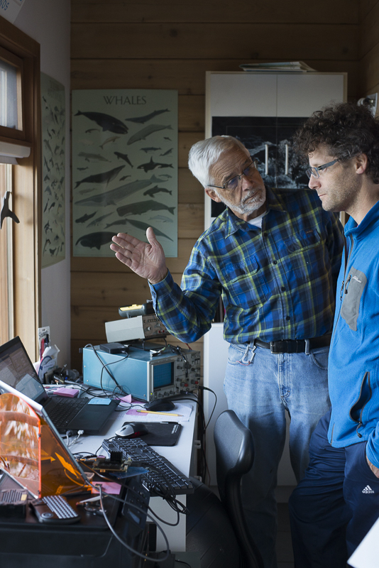 Val Veirs, left, discusses a vessel noise study with his son, Scott Veirs. Credit: Allegra Abramo