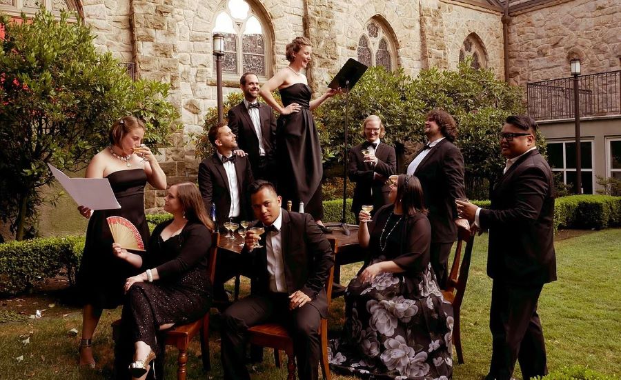 members of the choral ensemble in formal dress