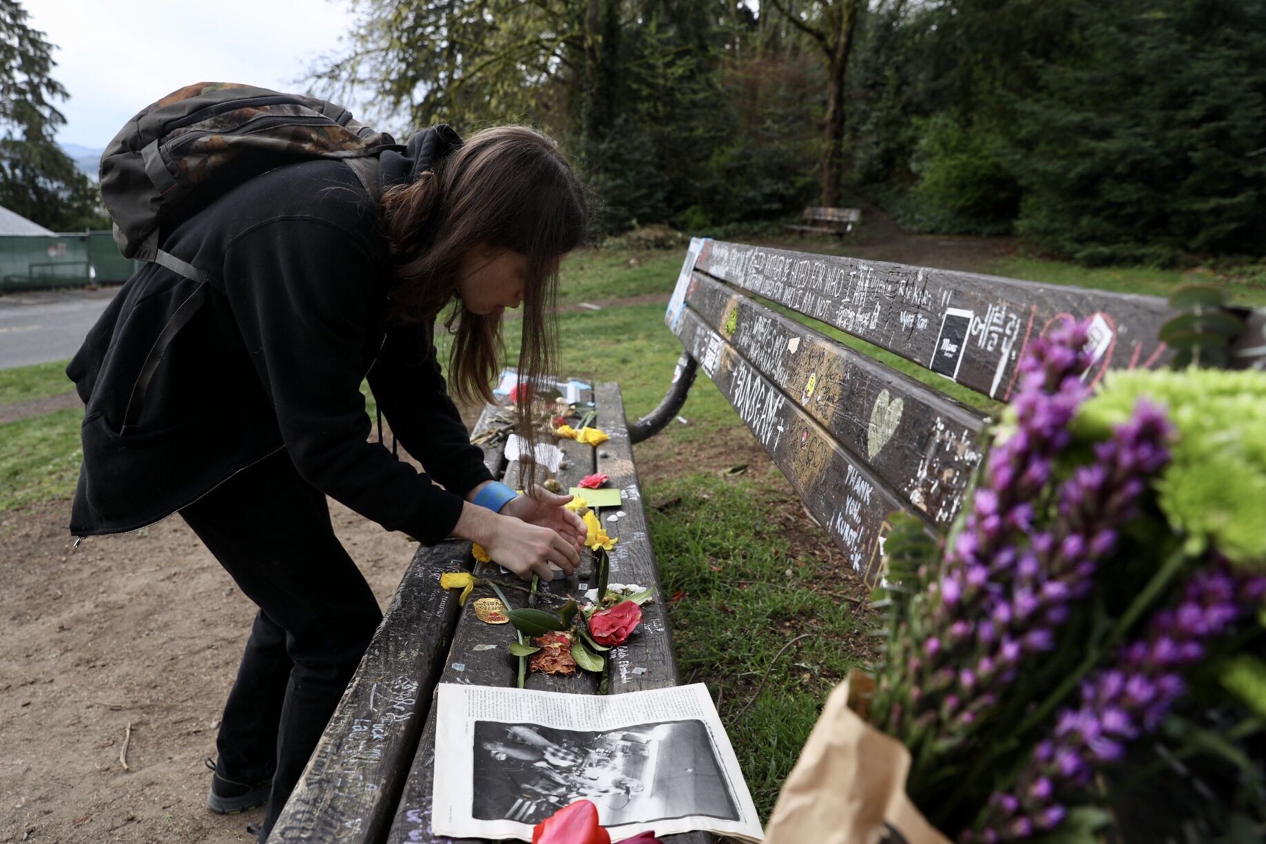 Ben Konzek was born in Seattle and now lives on Mercer Island. He’s visiting the bench at Viretta Park in Seattle to pay his respects on the 25th anniversary of Kurt Cobain’s death, April 5, 2019. “Kurt is important to me because he gave me and others who are different confidence and power.” (Photo by Matt M. McKnight/Crosscut)