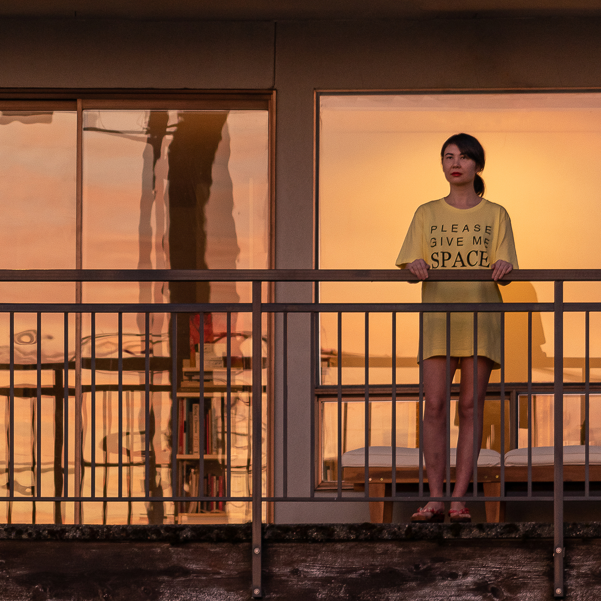 a portait of a woman on a balcony