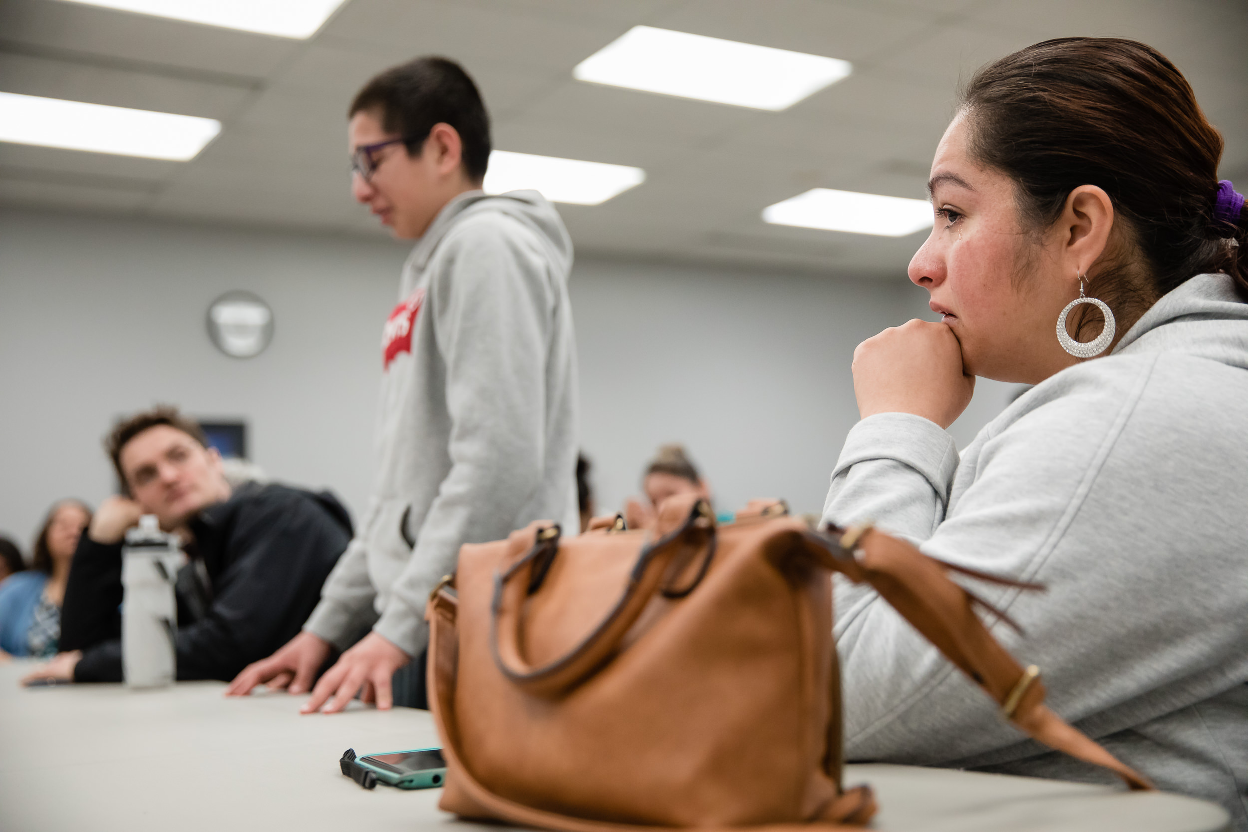 Gloria Rafaela Salas cries as she listens to her son, J Jesus Zepeda Salas, 14, describe his interactions with Immigration and Customs Enforcement agents.