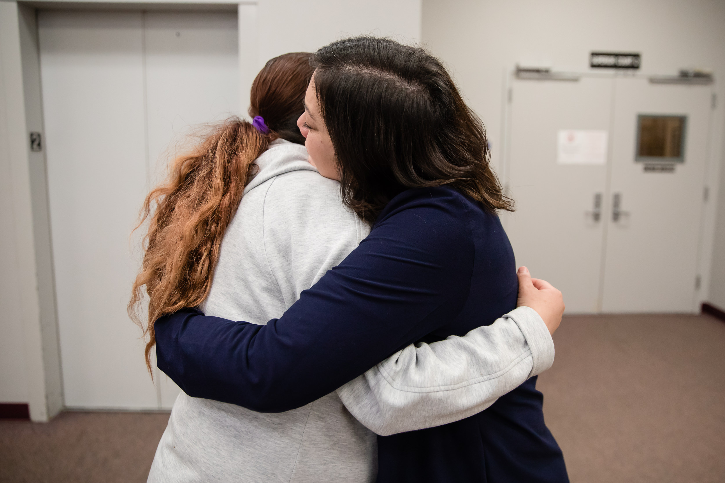 Abigail Scholar, right, executive director of Central Washington Justice For Our Neighbors, comforts Gloria Salas