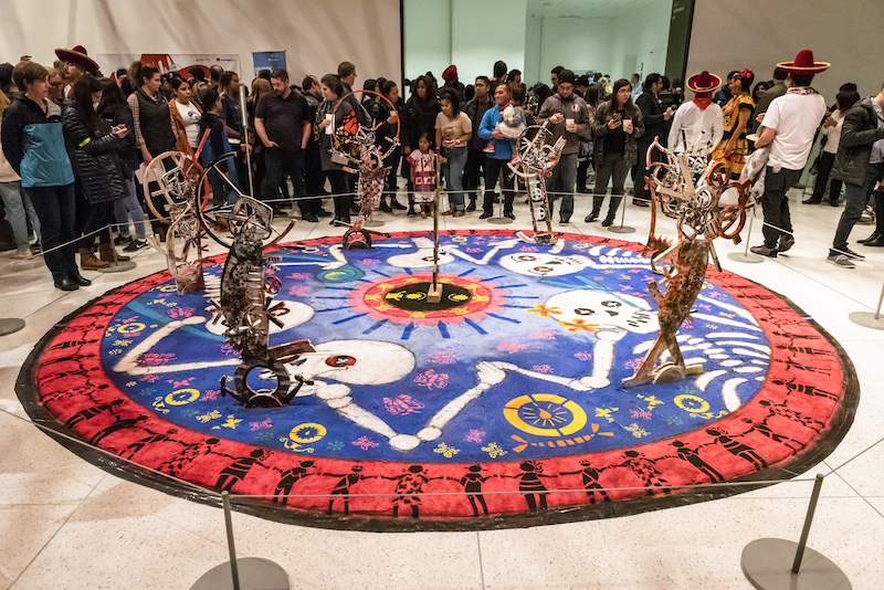 a traditional day of the dead sand painting