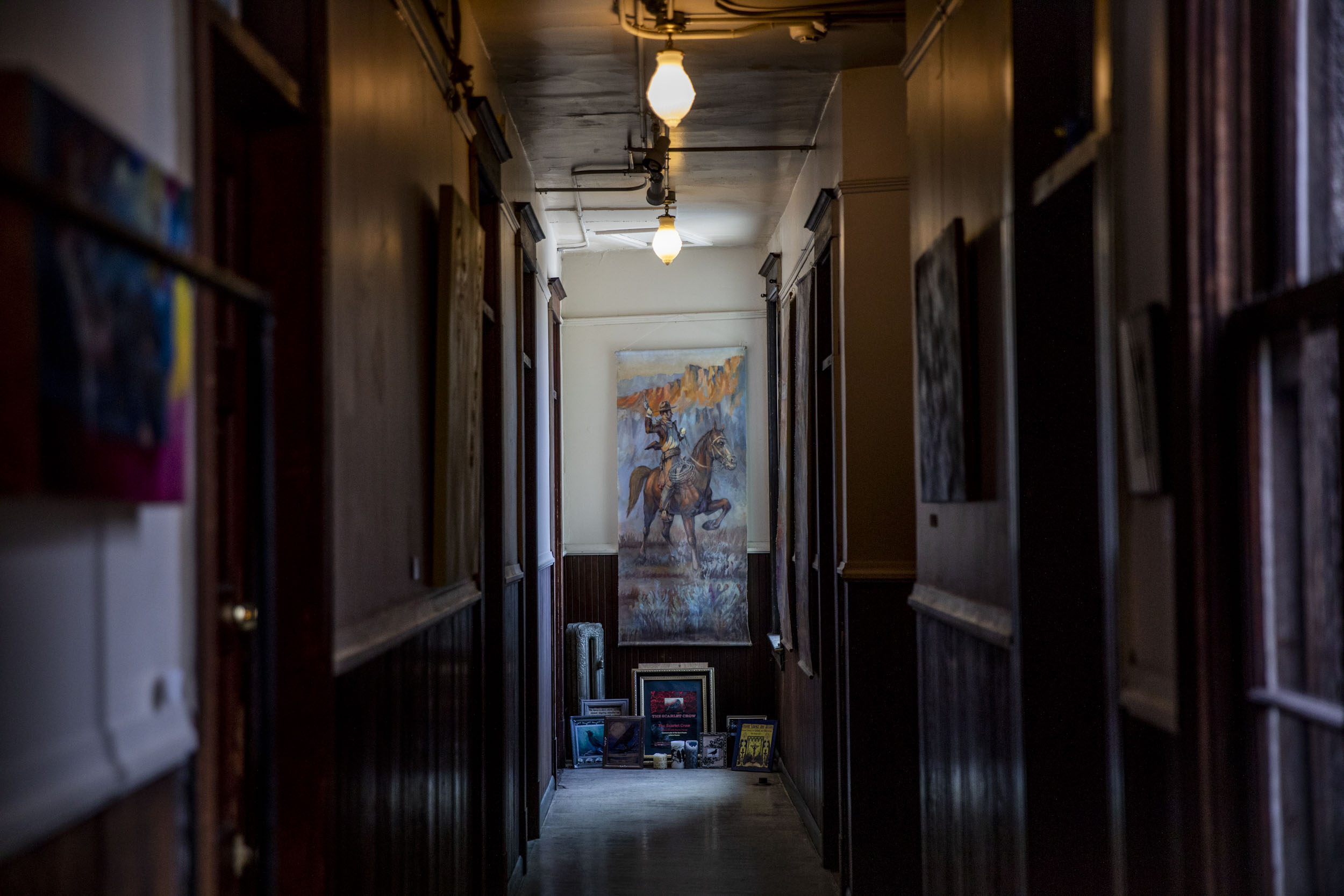 A hallway of apartments that John Bennett owns in the Georgetown neighborhood of Seattle on May 8, 2019. (Photo by Dorothy Edwards/Crosscut)