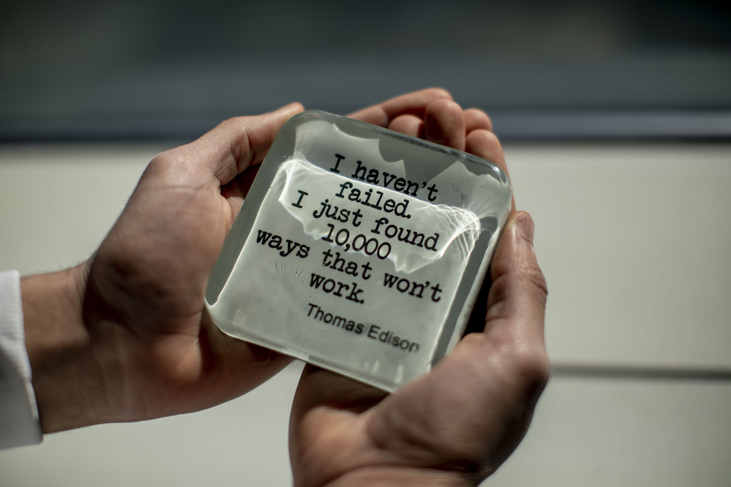 Eric Nealy holds a magnet sent by his mother at the Fred Hutchinson Cancer Research Center in Seattle.