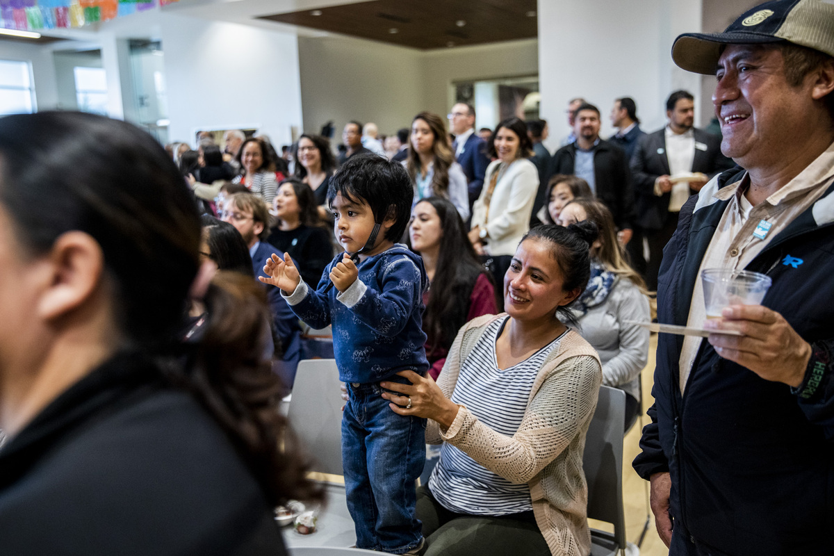 a crowd gathers to watch a traditional Mexican dance