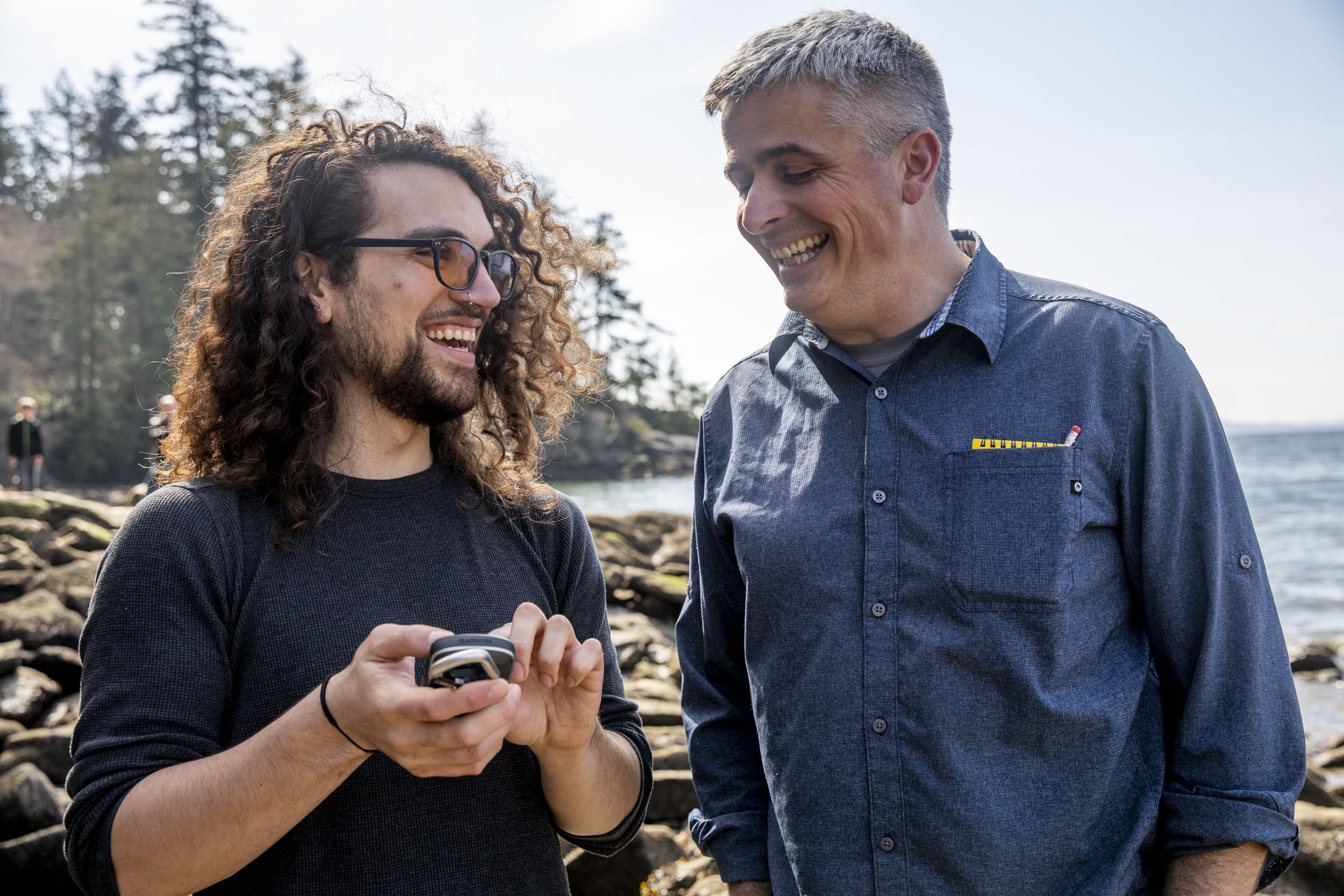 Western Washington University Assistant Professor of Environmental Science Marco Hatch, right, and Marine and Estuarine Science graduate student Octavio Cruz collect data along the coast of Larrabee State Park.