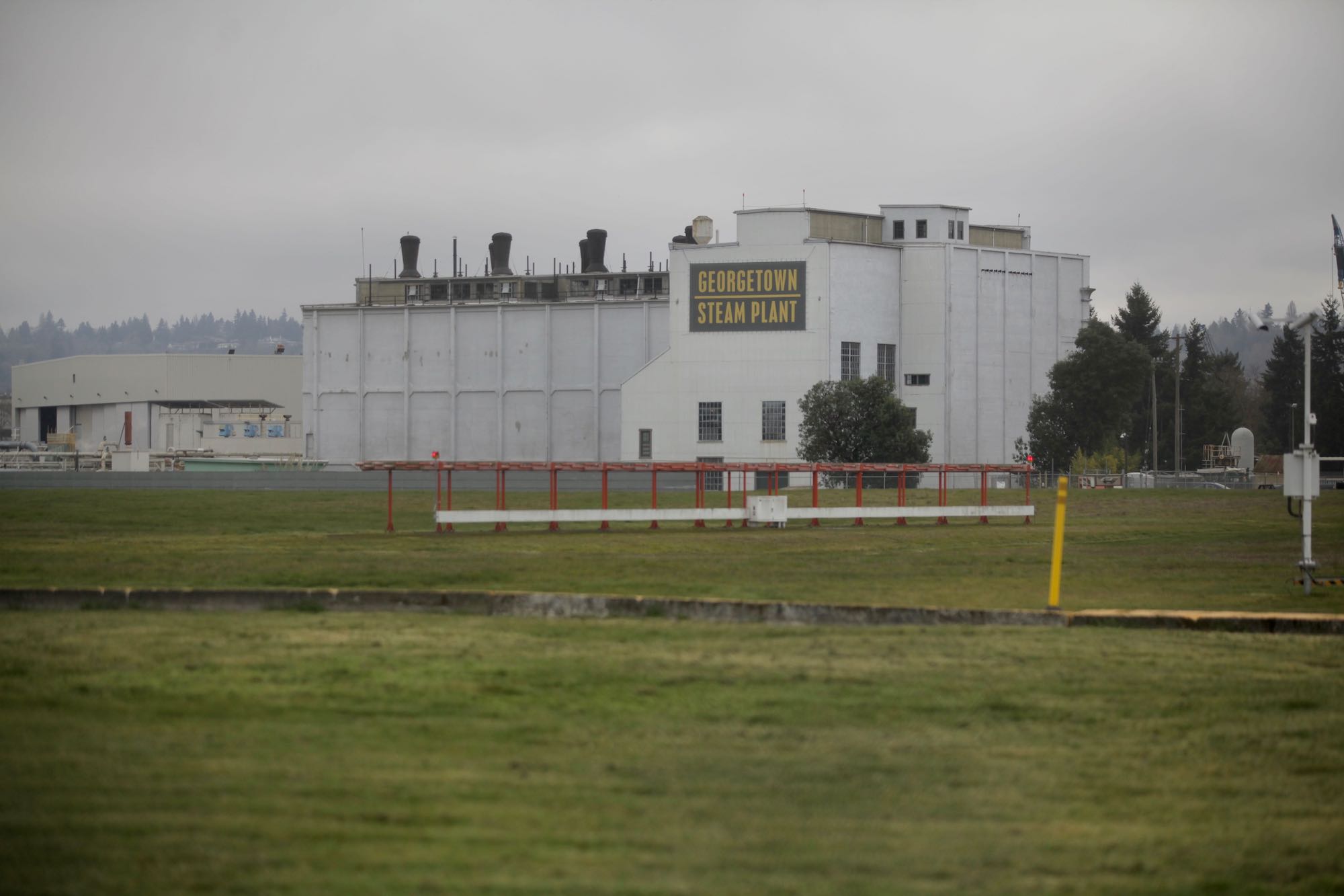 White building in grassy field