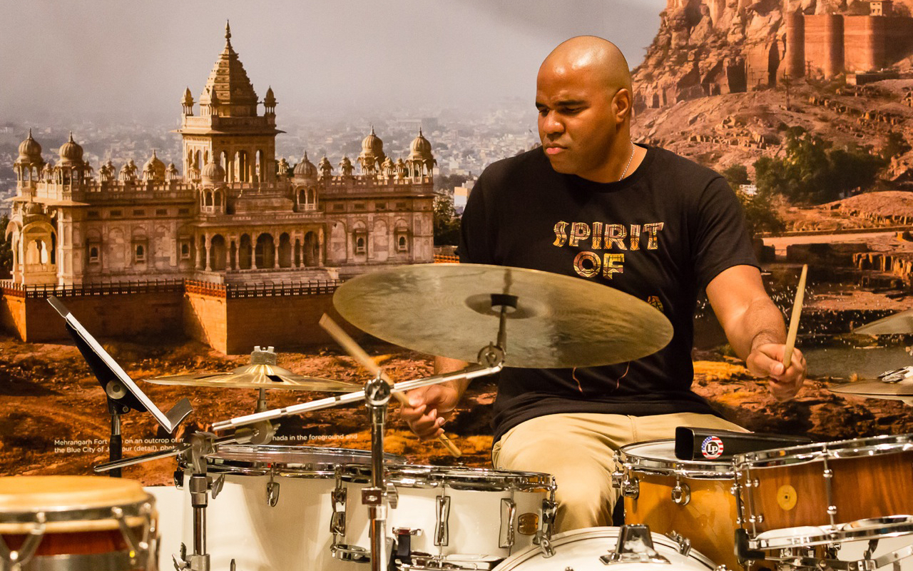 a drummer playing a drumset