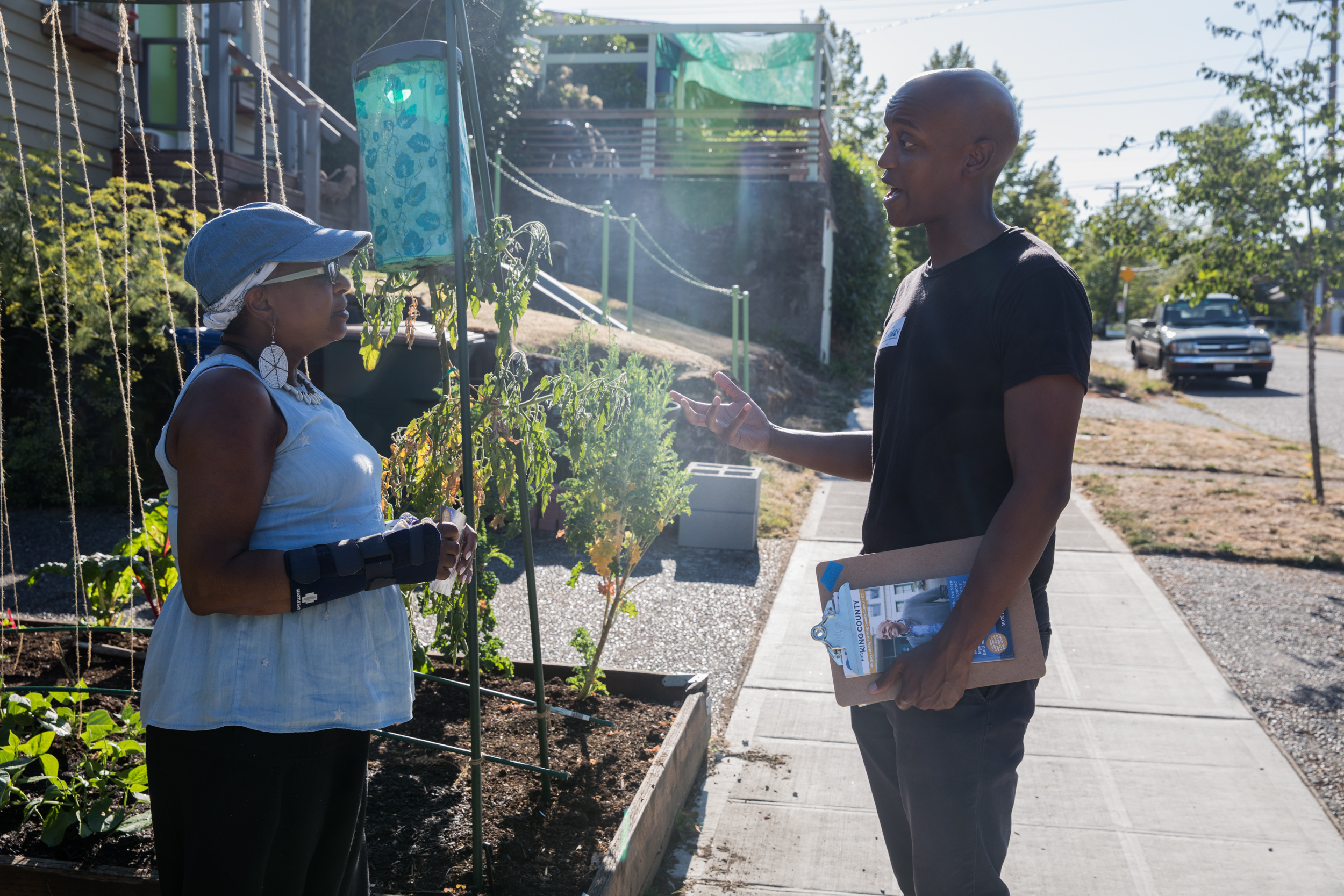 Girmay Zahilay talks to Phyllis Yasutake in South Seattle.