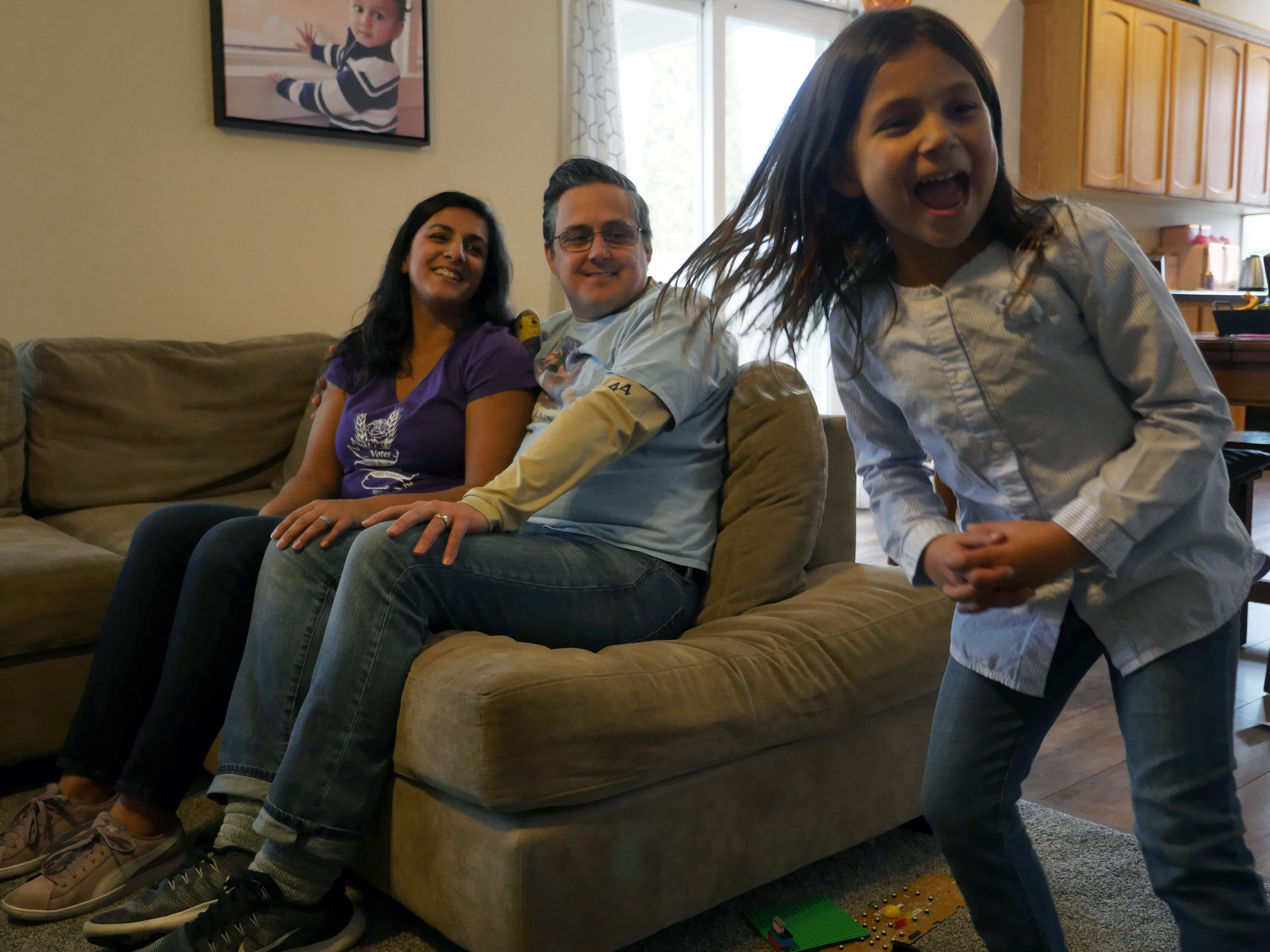 Roach and her family hang out in their living room.