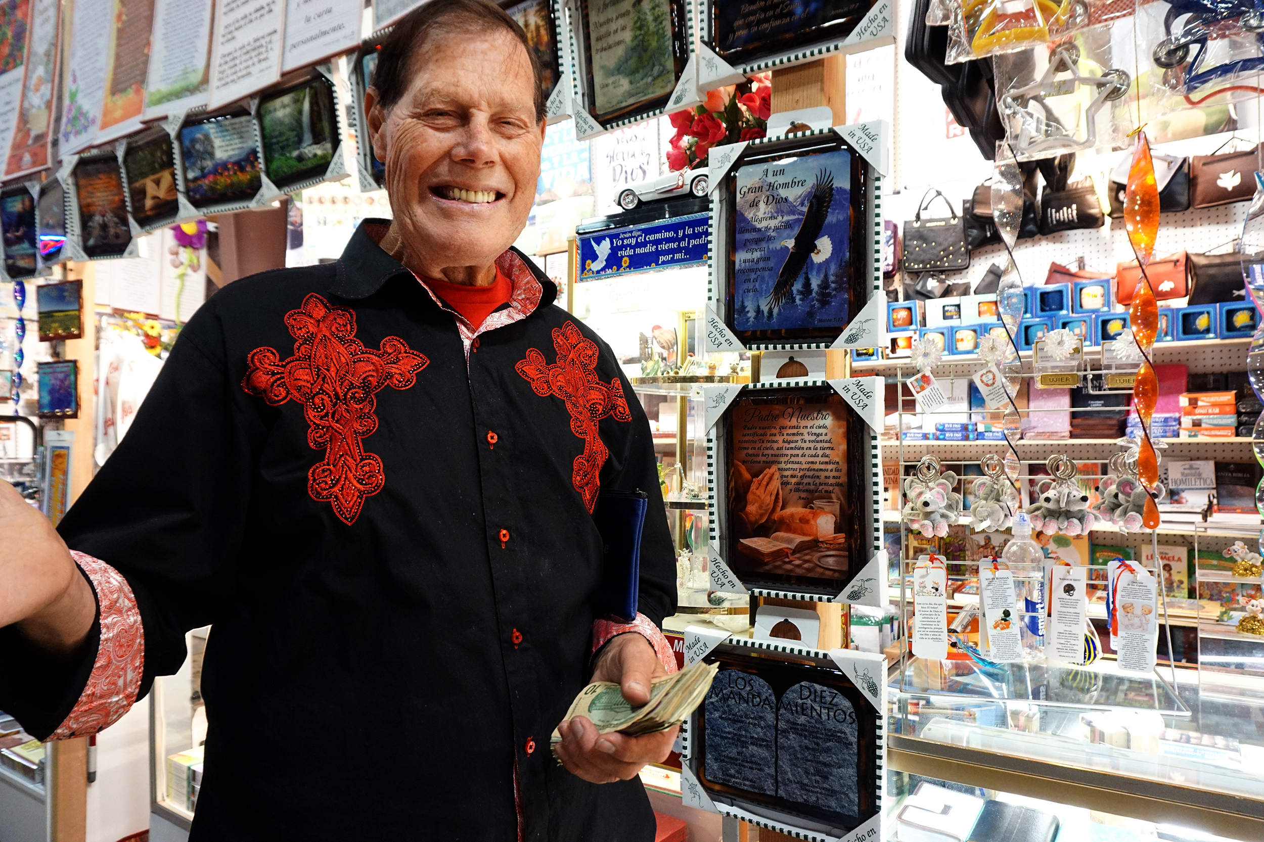 Hank Bardon grins with cash in hand at the Star Lite swap meet. 