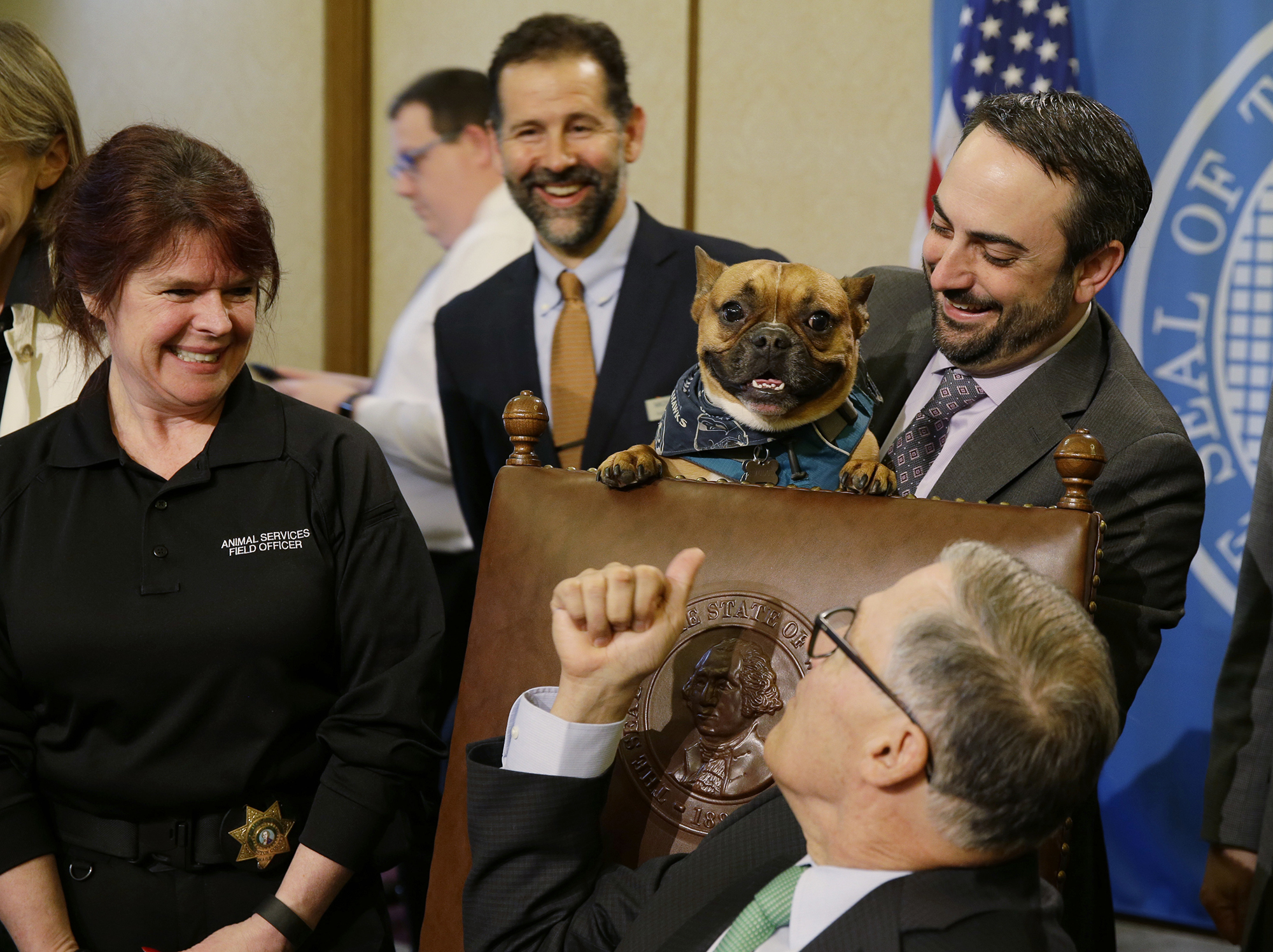 Guy Palumbo at a bill-signing ceremony with Jay Inslee.