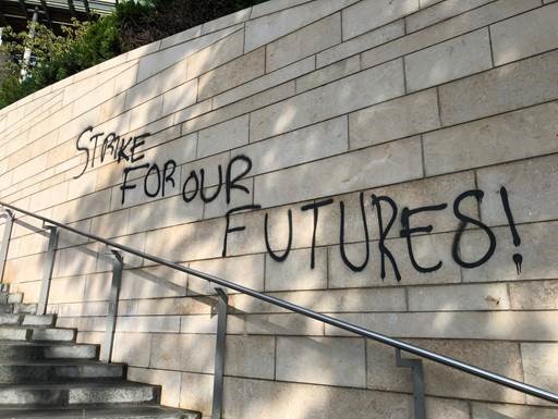 Spray-painted writing on City Hall walls