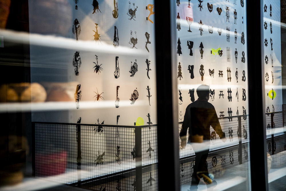 view of the hieroglyph mural by Ryan Feddersen at Burke Museum