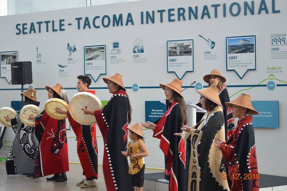 Native Americans in regalia at SeaTac