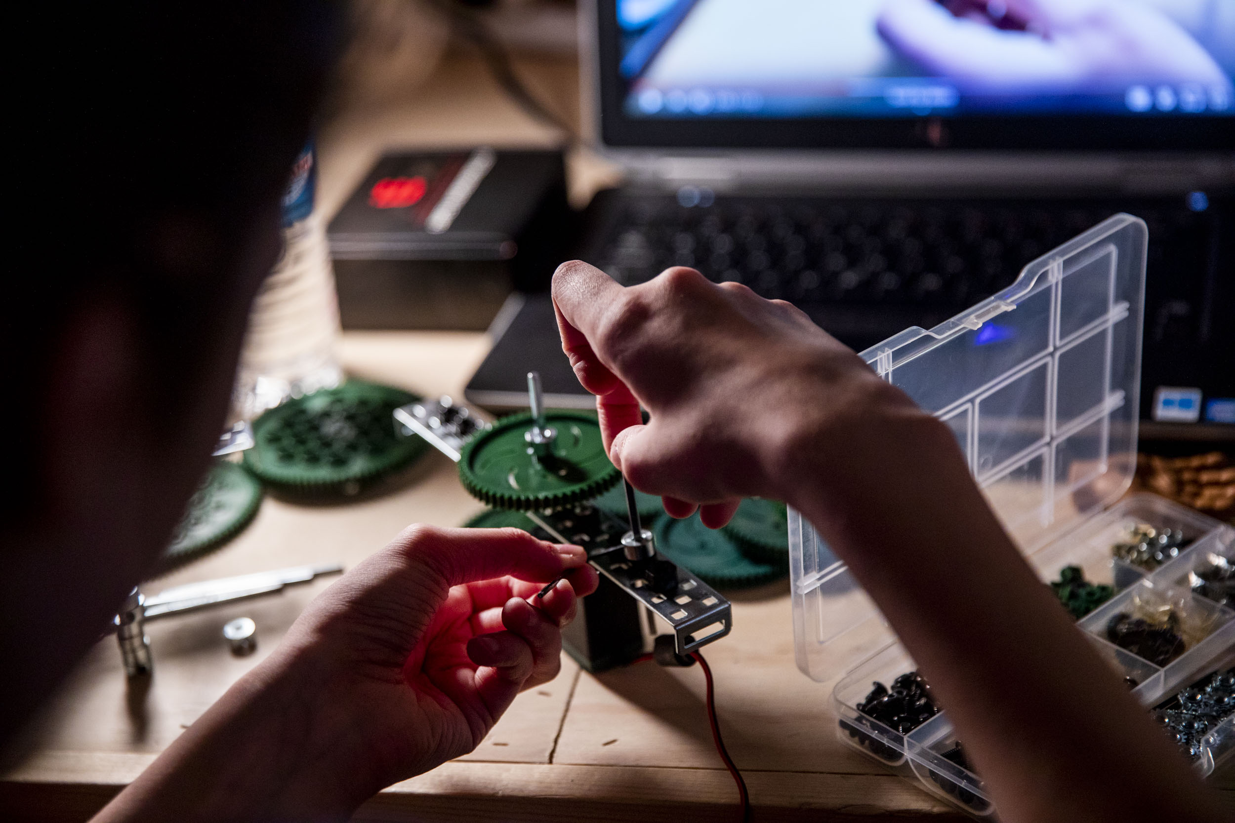 Eighth grader Maddie Bodenman works on her robot during a Nerdy Girls meetup in Ellensburg on May 17, 2019. (Photo by Dorothy Edwards/Crosscut)