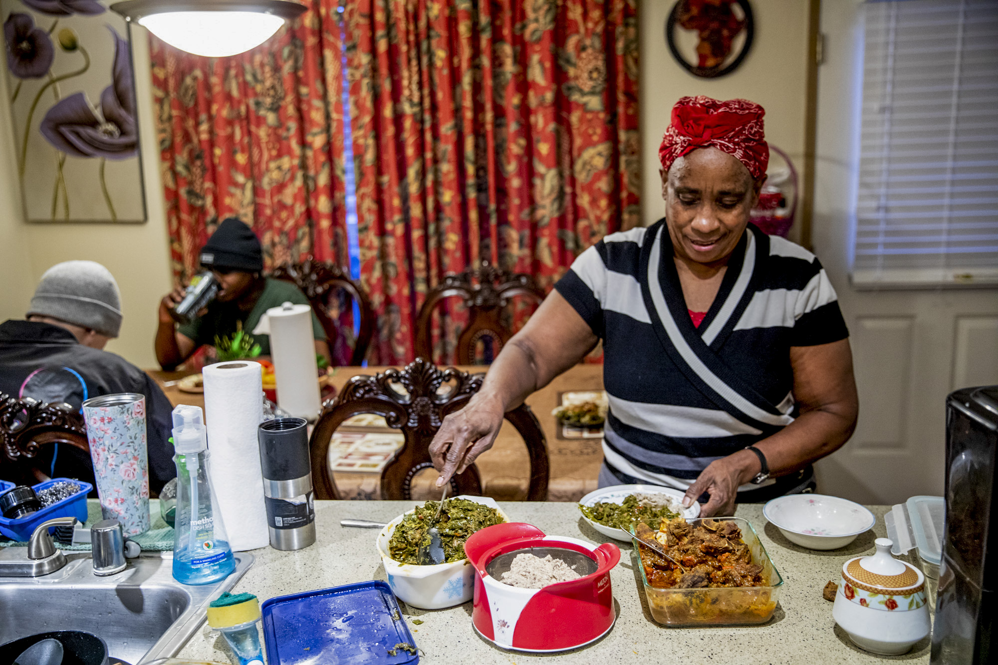 Veronica prepares dinner in her kitchen