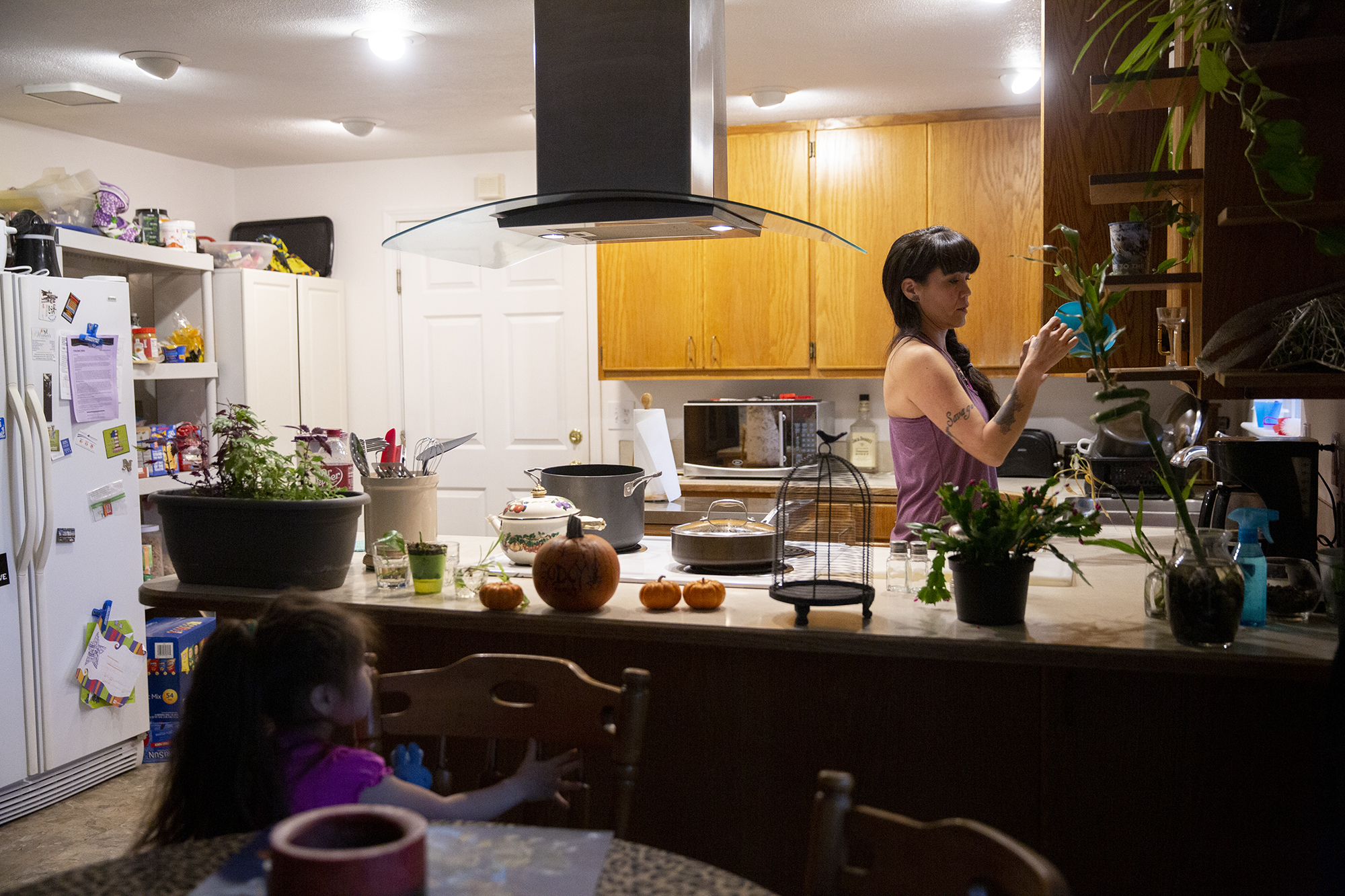 Melissa and her daughter in their home