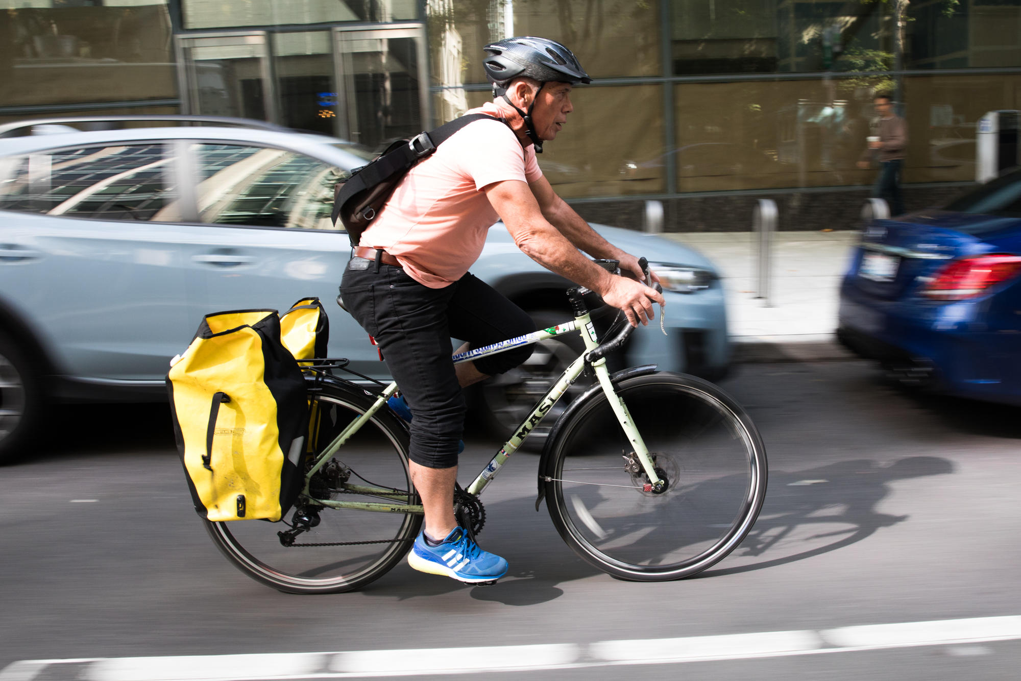 Johnny Ohta rides his bike