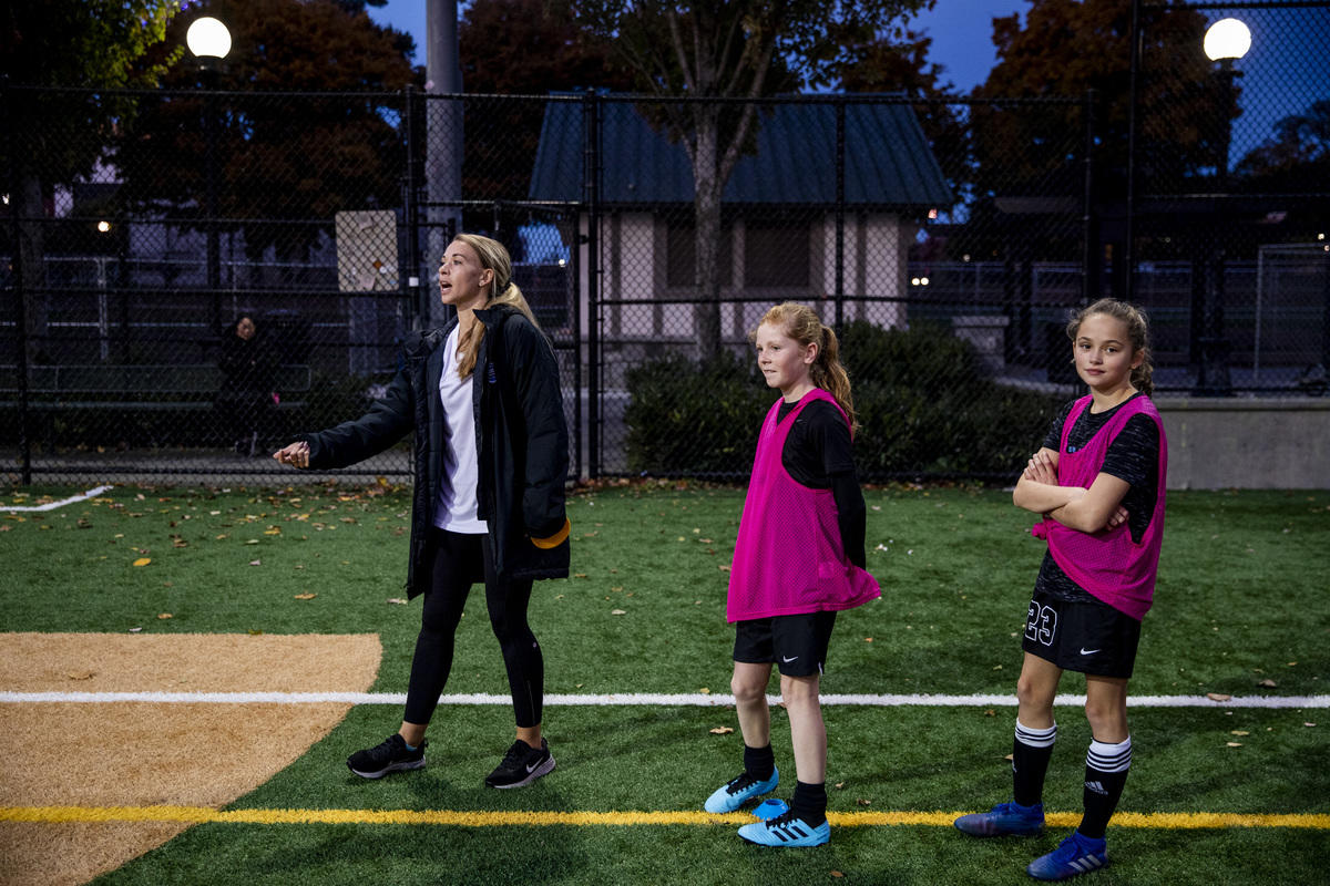 Coach Stephanie Verdoia and two of her players