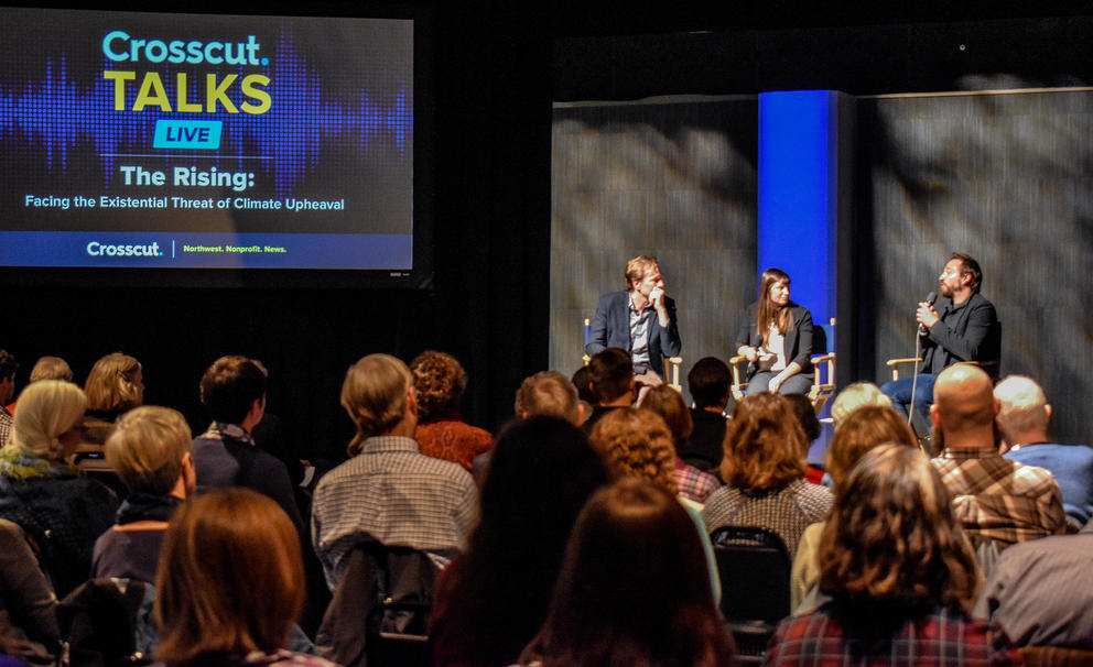 The two panelists answer questions from a moderator