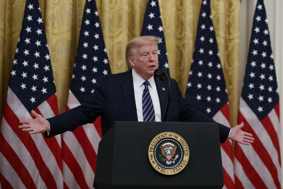 President Donald Trump at a podium