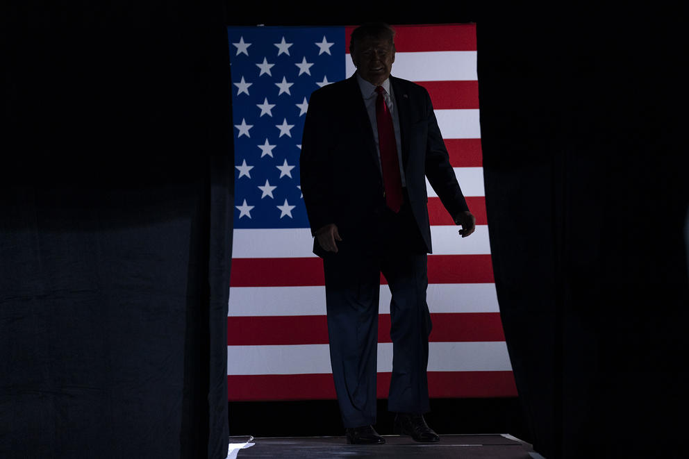 President Trump in front of an American flag