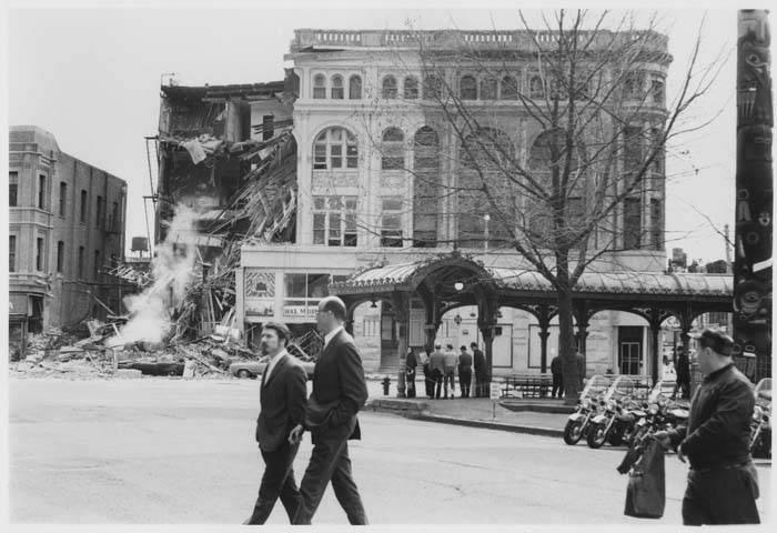 Street scene with partially collapsed building