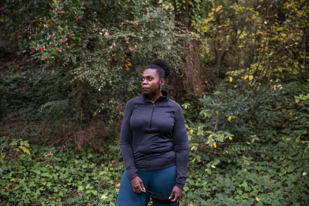 Jamila Taylor outside, with trees and greenery in background