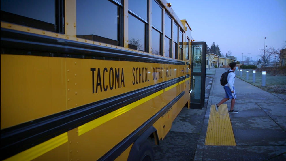 Kid walking off school bus