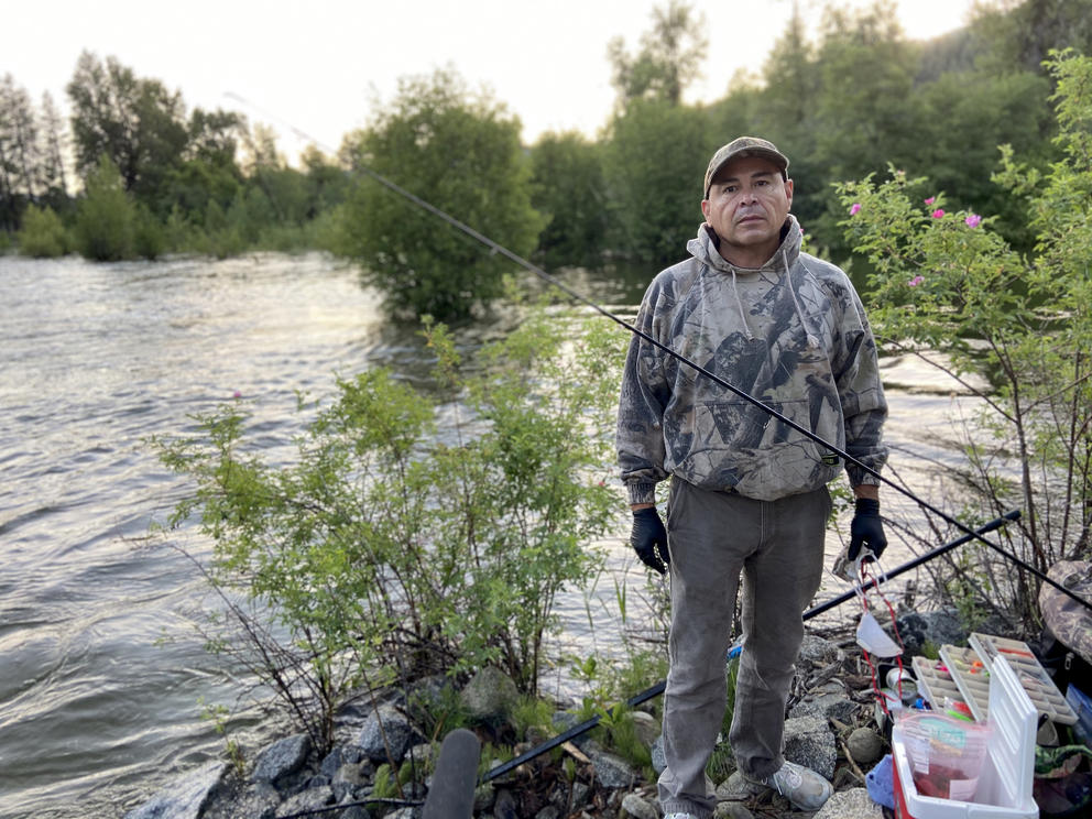 John Sirois stands on the shore of Icicle Creek