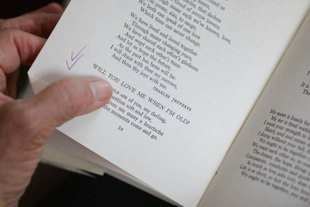a close up of a page of a poetry book. The poem in focus is titled "Will you love me when I'm old"