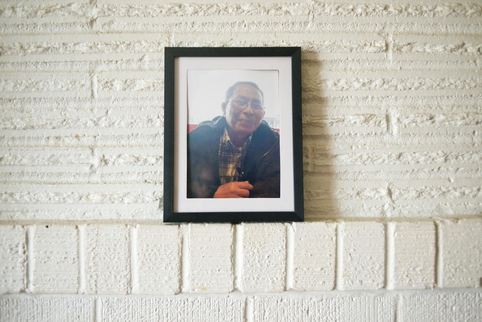 A photograph of Sun Khliu, taken just before his detention, is displayed at the home of his daughter, Bopha Khliu, in Portland.