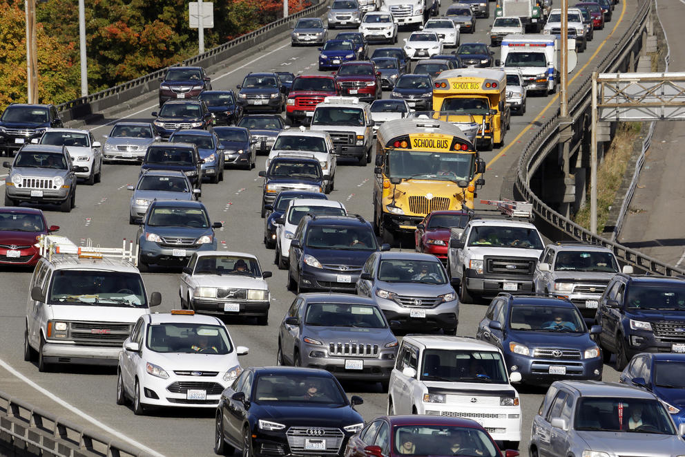 In this Wednesday, Oct. 11, 2017, photo, traffic fills all lanes of Interstate 5 heading into downtown Seattle.