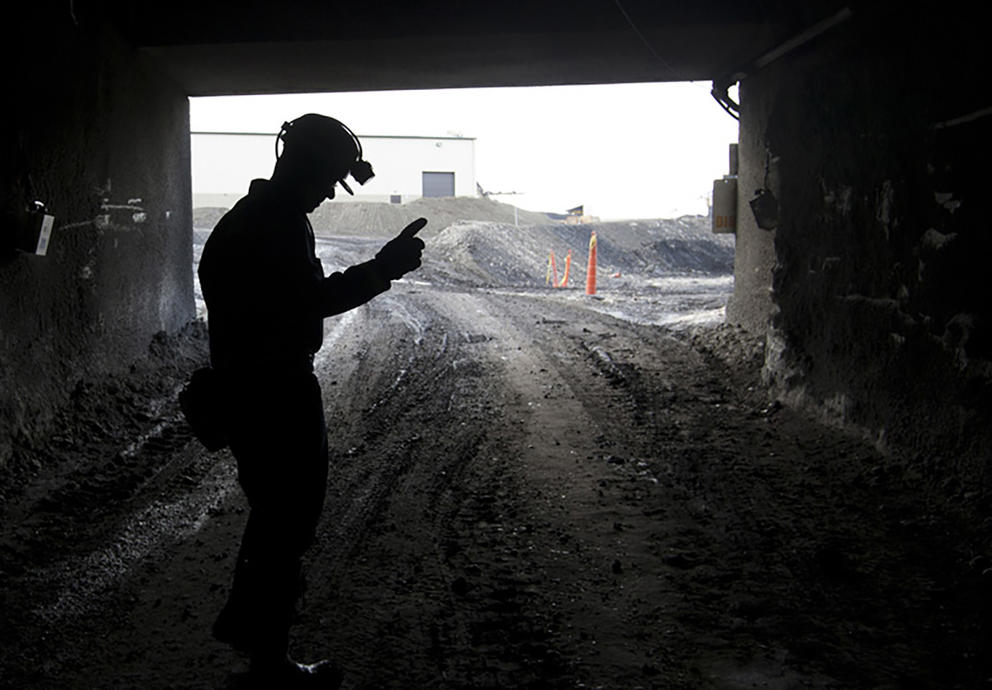 A miner at a facility in Roundup, Montana, in 2010. (Photo by Janie Osborne/AP Photo)