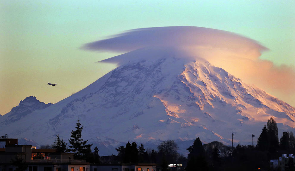 a mountain covered by a cloud 