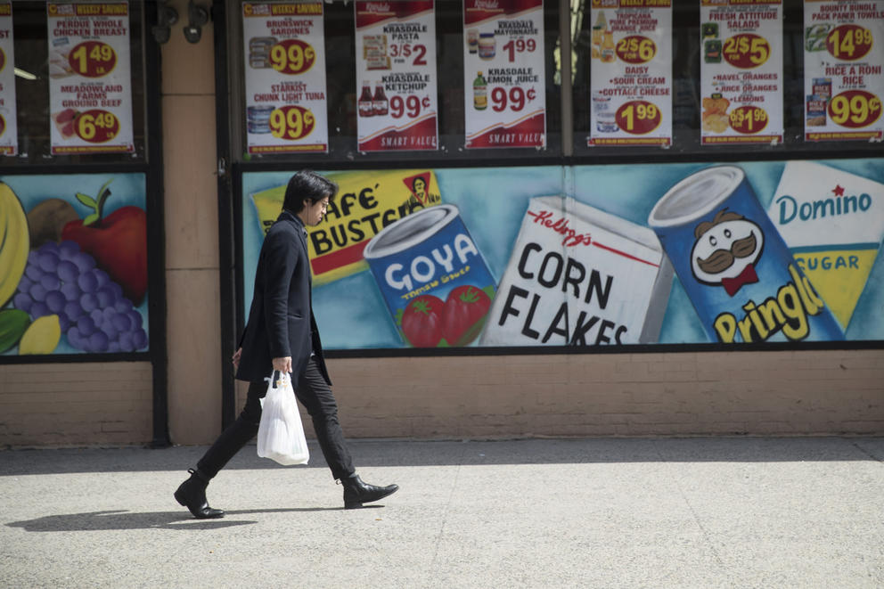 Man walking with grocery bag