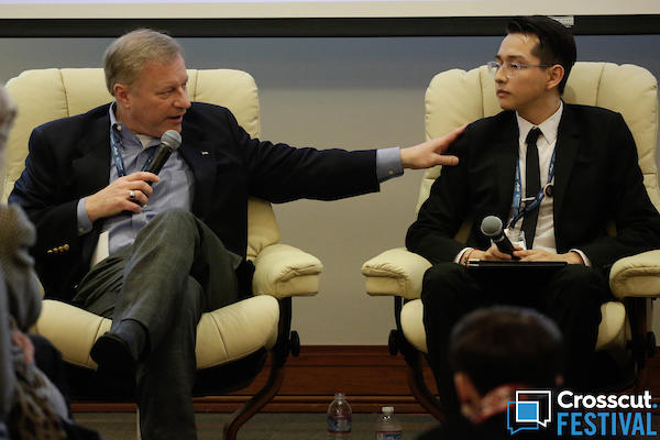 Talk show host John Carlson and Carlos Rodriguez during 'The Fate of the Dreamers' at Crosscut Festival 2018 in Seattle on Feb. 3, 2018.