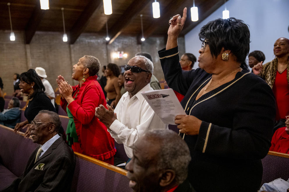 Members of the congregation singing